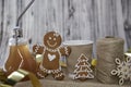 Bulb cup and cardboard cup, gingerbread cookies. Christmas ornaments. Wooden and sackcloth organic Christmas background