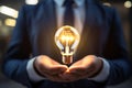 a bulb in hand of businessman, creative concept, closeup, Generated AI