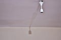 Bulb holder hanging on the ceiling. Empty is not plugged in Royalty Free Stock Photo