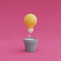 Idea and creativity concept with light bulb on pink background.Minimal design.3d render. Royalty Free Stock Photo