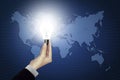 Bulb light in hand on world map Royalty Free Stock Photo