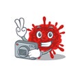 Buldecovirus mascot design as a professional photographer with a camera Royalty Free Stock Photo