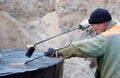 Bulder during waterproofing works with blowpipe torch Royalty Free Stock Photo