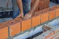 Bulder worker laying clay block 2 Royalty Free Stock Photo