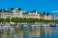 Buldings behind a lakeside promenade of the swiss city Geneva, S