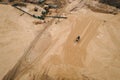 Buldozer machinery work in in opencast sand quarry