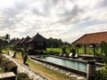 Bulgalow and pool in ricefields in Bali Royalty Free Stock Photo