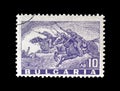 Cancelled postage stamp printed by Bulgaria, that shows Cavalry charge, circa 1946.