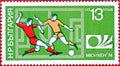 Postage stamp printed in Bulgaria with a picture of a footballs players, with the inscription `Munich 74 and emblem World Cup`