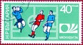 Postage stamp printed in Bulgaria with a picture of a footballs players, with the inscription `Munich 74 and emblem World Cup`