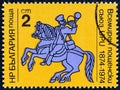 BULGARIA - CIRCA 1974: A stamp printed in Bulgaria issued for the centenary of UPU shows 19th century Postman, circa 1974. Royalty Free Stock Photo