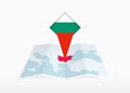 Bulgaria is depicted on a folded paper map and pinned location marker with flag of Bulgaria