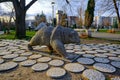 Bear sculpture in open park in Kardzali Bulgaria during early in the morning with sunshine. Royalty Free Stock Photo