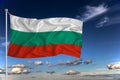 Bulgaria national flag waving in the wind against deep blue sky.  International relations concept Royalty Free Stock Photo