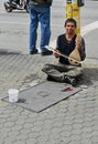 Bulgaria, Sofia, April 15, 2023: people in the Vitosha Boulevard. Street musician