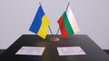 Bulgaria and Ukraine flags on politics meeting 3D illustration