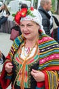 Bulgaria, village of Bulgarians. National embroidery in a women`s suit on Nestenar games