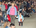 Bulgaria, village of Bulgarians. In search of a place for a small spectator of dancing on the coals on Nestenar games