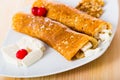 Bulgarian dish of pancakes with filling from brynza and walnuts Royalty Free Stock Photo