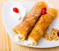 Bulgarian dish of pancakes with filling from brynza and walnuts Royalty Free Stock Photo