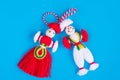 Bulgarian Martenitsa spring sign on blue background Royalty Free Stock Photo