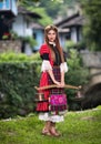 Bulgarian woman wearing a traditional costume in the Ethno village of Etar in Gabrovo, Bulgaria