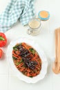 Bulgogi Japchae, Stir Fried Korean Vermicelli Noodles with Vegetables and Beef Topped with White Sesame Seed