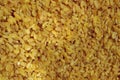 Pile of Bulgur Background. Top View. Bulgur Texture. Cropped Shot Of Grain. Royalty Free Stock Photo