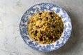 Bulgur pilaf with legumes with peas, beans and corn kernels Royalty Free Stock Photo