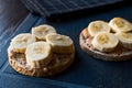 Bulgur Rice Cakes with Sliced Bananas and Peanut Butter / Round Crackers Royalty Free Stock Photo