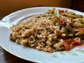 Bulgur Rice made with Siyez Unu Einkorn Flour Triticum monococcum with Green Beans Zeytinyagli Fasulye / Pilav or Pilaf.