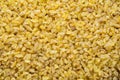 Bulgur wheat grains as background Royalty Free Stock Photo