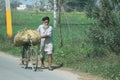 Bulhowal Punjab India 02 25 2021 A real hero food producer farmer on a bicycle in the fields