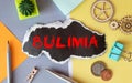 Bulimia Nervosa word, medical term word with medical concepts in blackboard and medical equipment Royalty Free Stock Photo