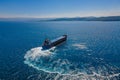 Bulk carrier ship manoeuvring in sea Royalty Free Stock Photo