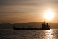 Bulk-carrier ship at sunset Royalty Free Stock Photo
