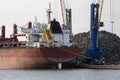 Bulk carrier ship about to take cargo of scrap metal. UK