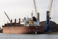 Bulk carrier ship about to take cargo of scrap metal. UK