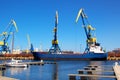 Bulk carrier ship unloading by crane