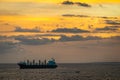 Bulk carrier under bright sky during sunset, Puerto Quetzal, Guatemala Royalty Free Stock Photo