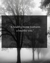Misty Tree Silhouette with A Healthy Home Nurtures a Healthy You Quote for Serenity Motivational Art Royalty Free Stock Photo