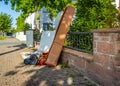 Bulk garbage day concept, miscellaneous rubbish items put on a street for council bulk waste collection