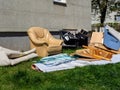 Bulky waste collection at the house in a meadow Royalty Free Stock Photo