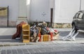 Bulky waste on the street. Broken beds, garbage furniture on pavement ready for bulky waste collection.