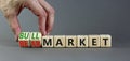 Bull or bear market symbol. Businessman turns wooden cubes and changes words Bear market to Bull market. Beautiful grey table grey Royalty Free Stock Photo