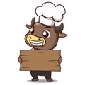 Bull chef holds a signage wood