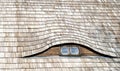 Bull eye roof window. Royalty Free Stock Photo
