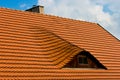 Bull eye roof window red tiles Royalty Free Stock Photo