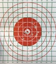 Bull eye target with bullet hole. Royalty Free Stock Photo