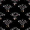 Bull heads on black background, seamless